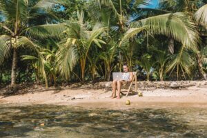 woman on beach working